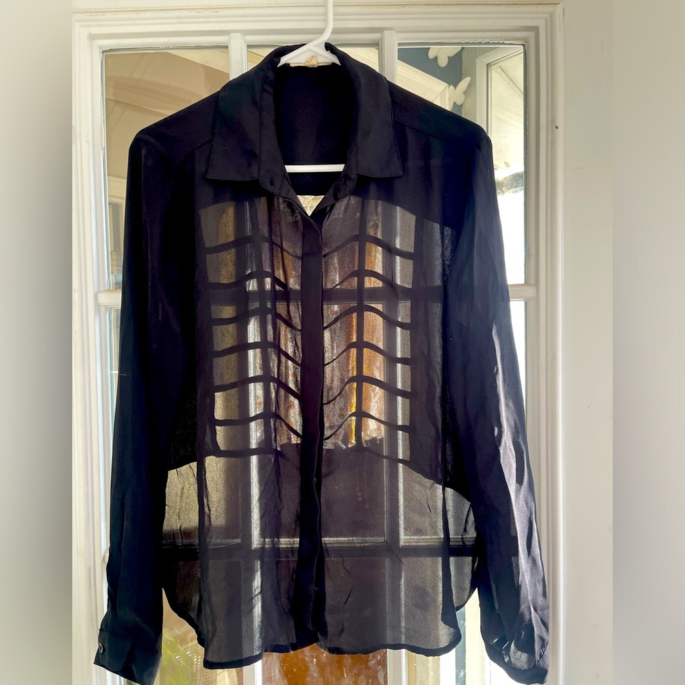 Sheer black top with cutout back detail